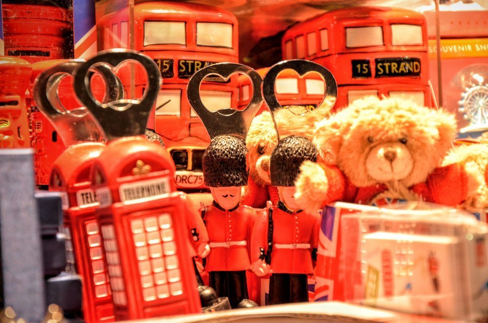 Canva - Brown Teddy Bear Near Red Miniature Telephone Booth
