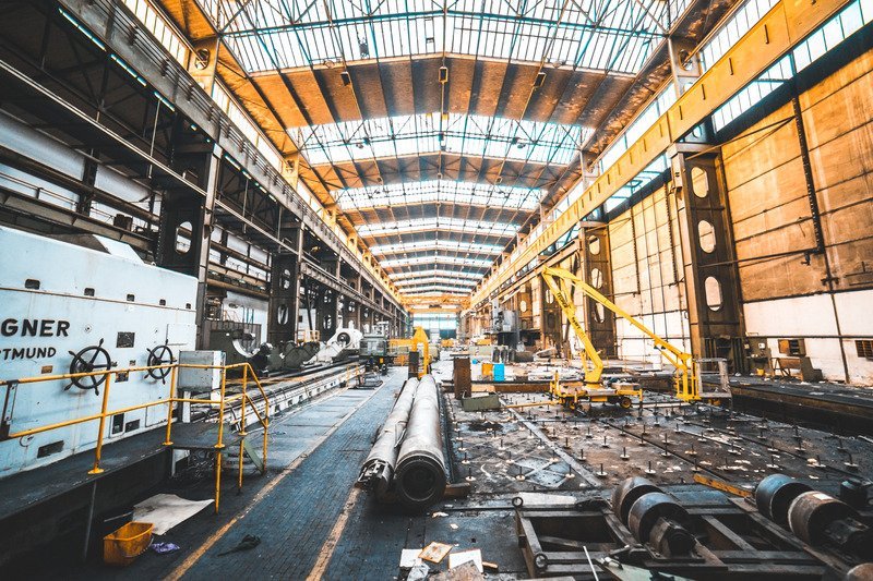 Canva - White Generator Set Near Industrial Machines